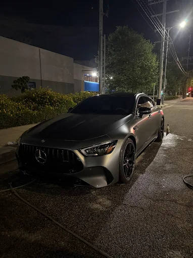 Freshly detailed luxury car at night